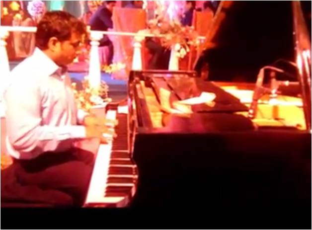 male piano player nashik
