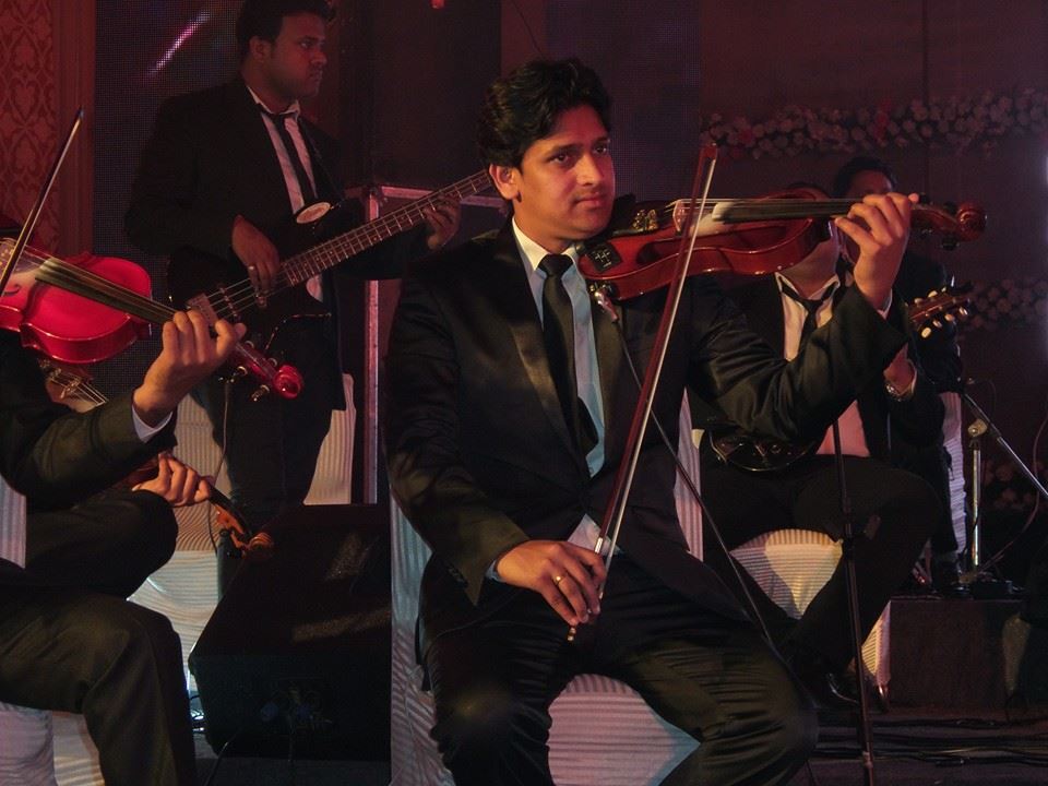 male violin player nashik